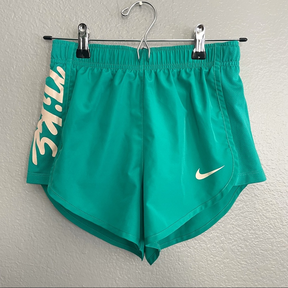 Nike Teal Graphic Running Shorts. LOVED these but they don’t fit me!!